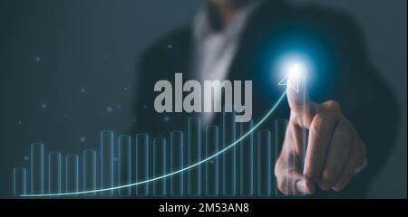 Business Development to Success and Growth Concept. Börsenhandel. Geschäftsmann diskutiert und analysiert Diagramm Stock.Stock Chart Konzept Stockfoto