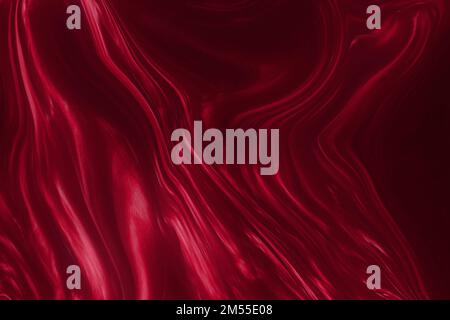 Abstrakter und dekorativer Fluss von Viva Magenta-Tönen. Weicher und farbiger Hintergrund für die Darstellung von Texturen. Stockfoto