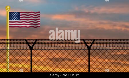 Die amerikanische Flagge winkt an der Verteidigungsgrenze bei Sonnenuntergang. Stockfoto