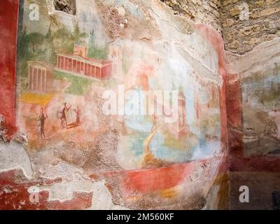 Kunstvoll bemalte Wandmalereien in einer Villa in Pompeji, Italien Stockfoto