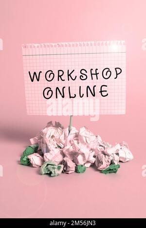 Unterschreiben Sie, dass Workshop Online angezeigt wird. Wort auf dem Raum oder Gebäude, in dem Waren repariert werden Stockfoto