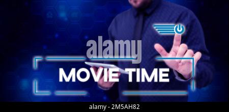 Handschrift-Schild Filmzeit. Business Showcase die geplante oder tatsächliche Zeit, zu der eine Show oder ein Film beginnt Stockfoto
