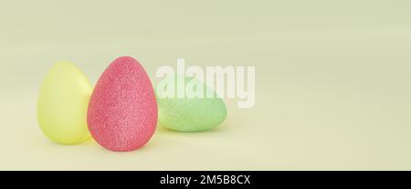 Glitzernde und farbenfrohe Ostereier auf pastekgelbem Hintergrund. Stockfoto
