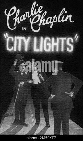 CHARLIE CHAPLIN als der Tramp HARRY MYERS und HARRY AYERS in CITY LIGHTS 1931, geschrieben und Regie von CHARLES CHAPLIN Stummkomödie mit der Musik Charles Chaplin Productions / United Artists Stockfoto