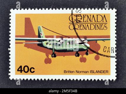 Stornierte Briefmarke, gedruckt von Grenada, auf der Britten Norman Islander, circa 1976, zu sehen ist. Stockfoto