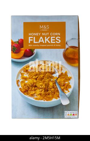 Schachtel Honignuss-Cornflakes mit knusprigen gehackten Erdnüssen und Honiggetreide von M&S, isoliert auf weißem Hintergrund Stockfoto