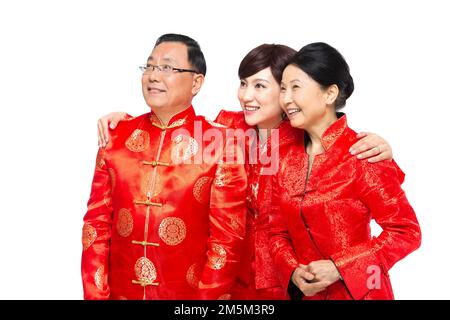 Frohe chinesische Neujahrskostümfamilie Stockfoto