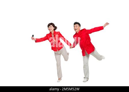 Glückliche Paare für das chinesische Neujahrskostüm Stockfoto