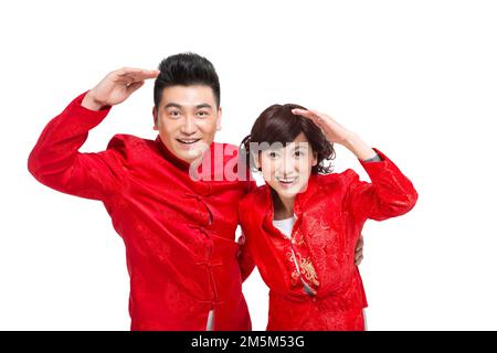 Glückliche Paare für das chinesische Neujahrskostüm Stockfoto