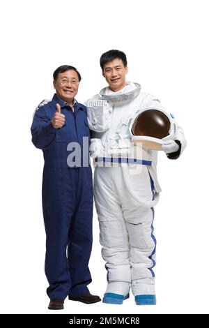 Fotoshooting männlicher Astronauten und Ingenieurteam Stockfoto