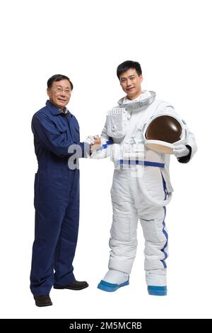 Fotoshooting männlicher Astronauten und Ingenieurteam Stockfoto