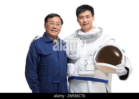 Fotoshooting männlicher Astronauten und Ingenieurteam Stockfoto