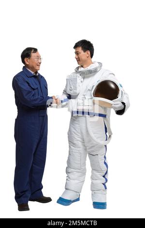 Fotoshooting männlicher Astronauten und Ingenieurteam Stockfoto