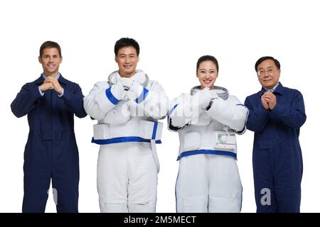 Fotoshooting männlicher Astronauten und Ingenieurteam Stockfoto