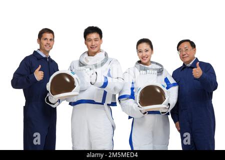 Fotoshooting männlicher Astronauten und Ingenieurteam Stockfoto