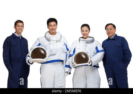 Fotoshooting männlicher Astronauten und Ingenieurteam Stockfoto