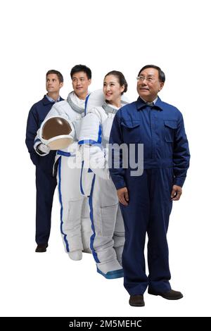 Fotoshooting männlicher Astronauten und Ingenieurteam Stockfoto