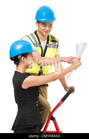 Baudesignerinnen und Bauarbeiter Stockfoto