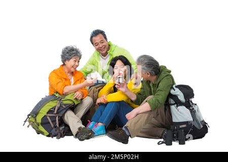 Vier ältere Menschen saßen zusammen, um sich auszuruhen Stockfoto