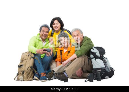 Vier ältere Menschen saßen zusammen, um sich auszuruhen Stockfoto