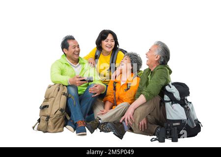 Vier ältere Menschen saßen zusammen, um sich auszuruhen Stockfoto