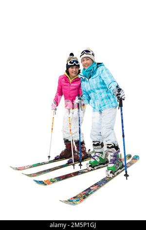 Glückliche alte Leute, die im Winter Ski fahren Stockfoto