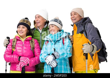 Frohe Winterreise in die Berge der älteren Menschen Stockfoto