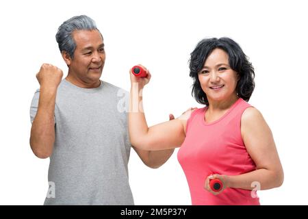 Pärchen mittleren Alters Kurzhantel Stockfoto