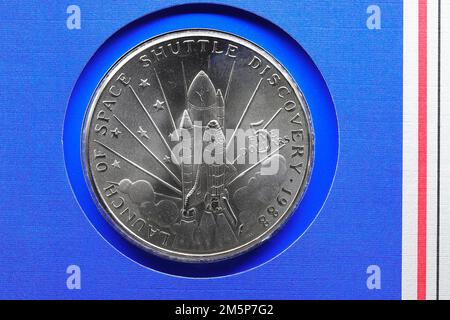 Nahaufnahme einer Space Shuttle Coin zur Erinnerung an den Start der Space Shuttle Discovery am 29. September 1988 vom Kennedy Space Centre Stockfoto