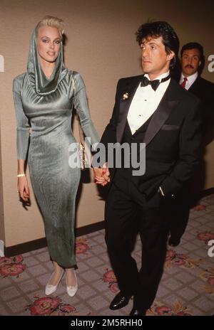 Sylvester Stallone und Brigitte Nielsen 1986 Quelle: Ralph Dominguez/MediaPunch Stockfoto