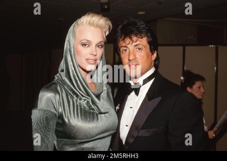 Sylvester Stallone und Brigitte Nielsen 1986 Quelle: Ralph Dominguez/MediaPunch Stockfoto