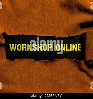 Unterschreiben Sie, dass Workshop Online angezeigt wird. Wort auf dem Raum oder Gebäude, in dem Waren repariert werden Stockfoto