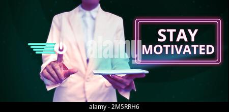 Handgeschriebener Text bleibt motiviert. Business Showcase Belohnen Sie sich jedes Mal, wenn Sie ein Ziel mit Wissen erreichen Stockfoto