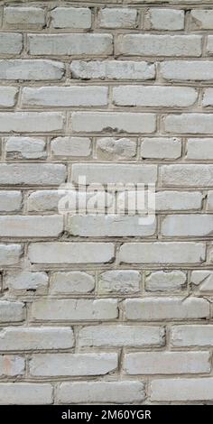 Weißer Wandhintergrund. Alte Schäbige Backsteinwand Mit Horizontaler Textur. Backwall-Hintergrund. Stonewall Hintergrundbild. Vintage-Wand Mit Geschältem Putz. Retro-Grun Stockfoto