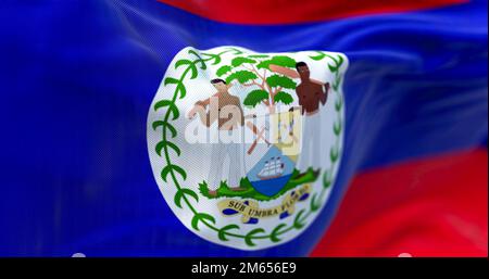 Nahaufnahme der Nationalflagge von Belize, die im Wind winkt. Belize ist ein unabhängiger Staat in Mittelamerika. Texturierter Hintergrund. Selektiv Stockfoto