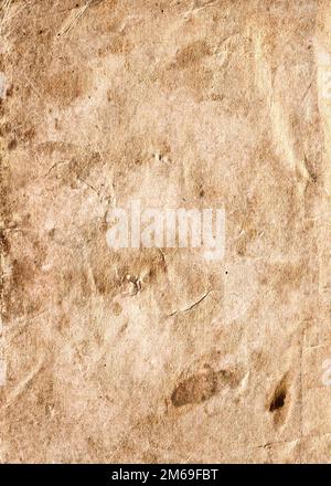 Altes, kollabierendes Papier mit Rissen und Kratzern Stockfoto