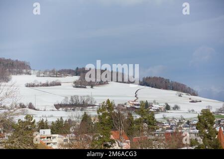 Reinach Village im Winter, Kanton Aargau, Schweiz Stockfoto