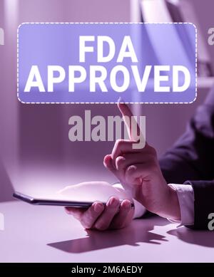 Schreiben mit dem Text FDA Approved (FDA-genehmigt). Laut FDA ist das Produkt oder die Formel sicher und/oder wirksam Stockfoto