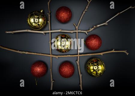 Weihnachten Tic-tac-Zeh auf Schwarz. Stockfoto