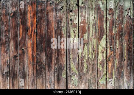 Alte verwitterte alte Grunge Holzbretter Tür geschlossen als Holz-Grungy Hintergrund Stockfoto