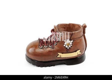 Stifthalter in verschiedenen Formen. Stifthalter in Form eines Skischuhls Stockfoto