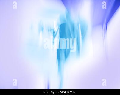 Medizinische Hintergrund und Menschen verschwommen. Verloschter Bokeh-Hintergrund bei Ärzten und Patienten. Stockfoto