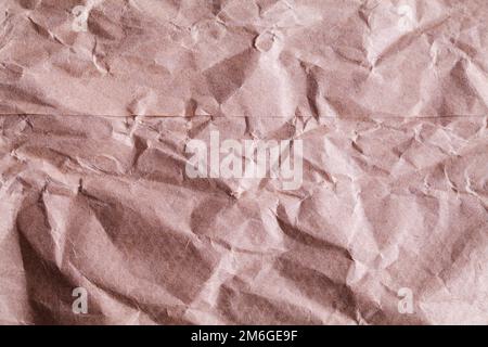 Braune Papiertasche Faltenstruktur Nahaufnahme Des Hintergrunds. Stockfoto