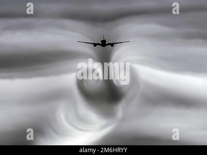 Die Turbulenzen der Wolken, die das Flugzeug während hinterlassen hat Stockfoto