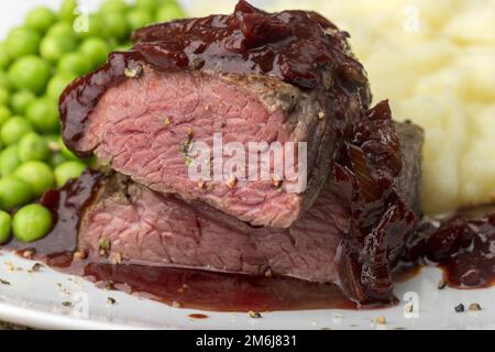 Hälfte eines Steak mit Kartoffelpüree Stockfoto