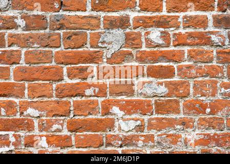 Alte rote Ziegelsteine, rustikale Wand Stockfoto