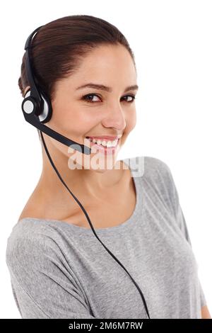 Sie genießt das Verkaufsumfeld. Studiofoto einer jungen Frau mit Freisprecheinrichtung. Stockfoto