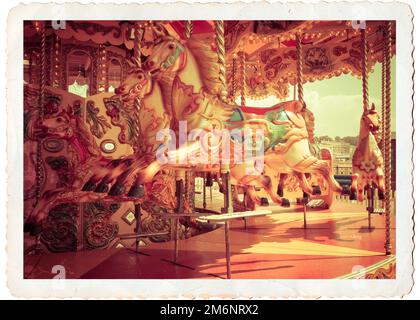 Bild im Vintage-/Retro-Stil einer „Merry Go Round“-Runde Stockfoto