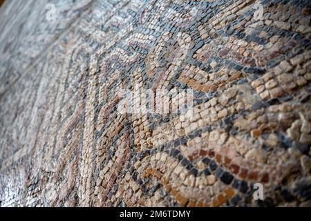 Nahaufnahme eines antiken römischen Mosaiks Stockfoto