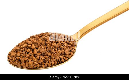 Instant-Kaffee in Goldlöffel isoliert auf weißem Hintergrund Stockfoto